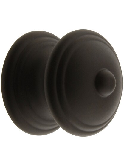 Traditional Brass Cabinet Knob with Turned Base - 1 1/4 inch Diameter in Oil Rubbed Bronze.